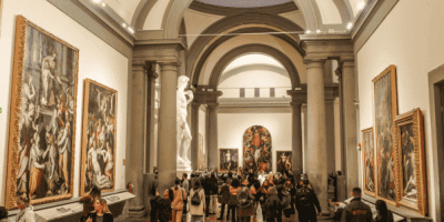 Religious artwork and marble sculptures in the Academy Gallery in Florence, Italy.