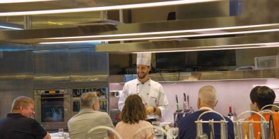 cooking class in Florence, at Mercato Centrale. Cooking class listening to instructions on using ingredients of Tuscan cuisine