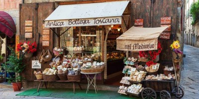 Street shop with local food produce in Tuscany.