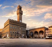 People buy fruit at Mercato Centrale market in Florence, Italy.